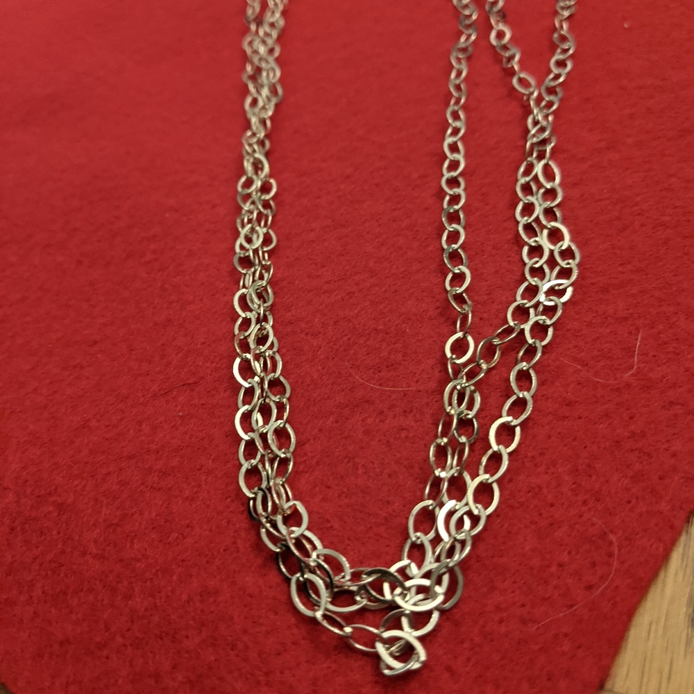 Paola Valentini multi strand sterling silver long necklace. 3 strand-chain